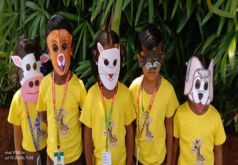 Showing kindergarten children animal toys or picture of domestic animals like Dog, Cats and Cows to grab their attention, and then involving them in interactive activities.